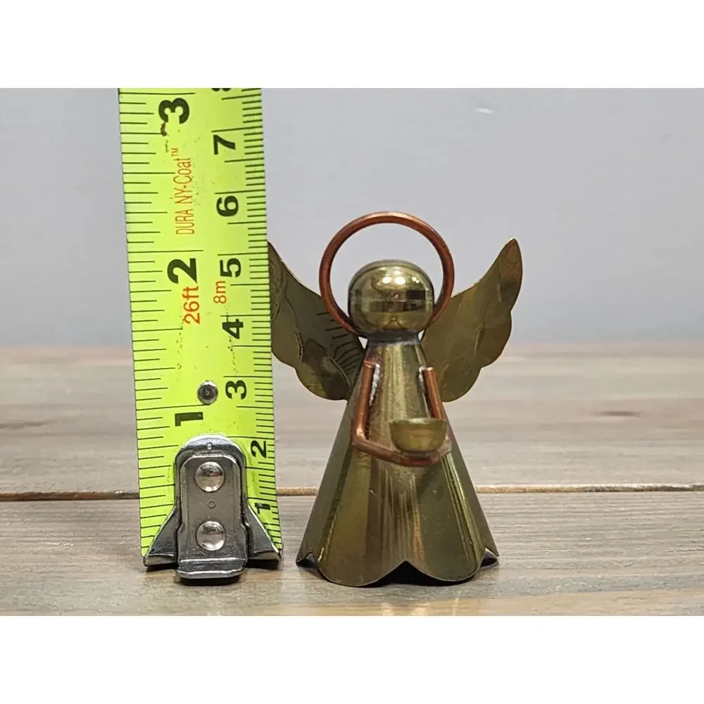 ONE VINTAGE BRASS AND COPPER ANGEL CANDLE HOLDER 2.5 inches tall
